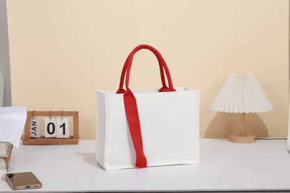 Red ribbon handbag